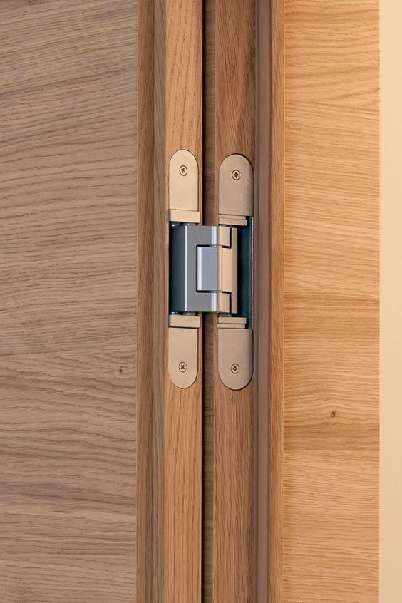 CONCEALED DOOR HINGE